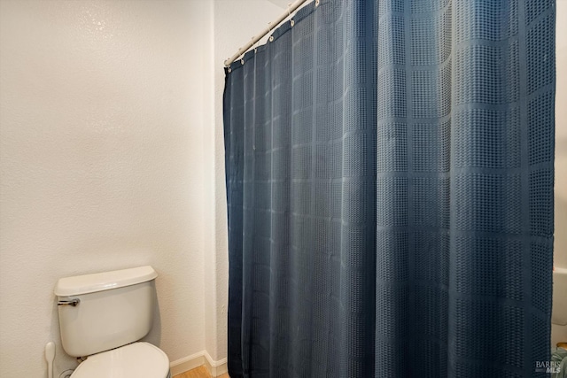 236 Cogburn Way, Vacaville, CA 95687 - bathroom with toilet, wood finished floors, and a shower with curtain