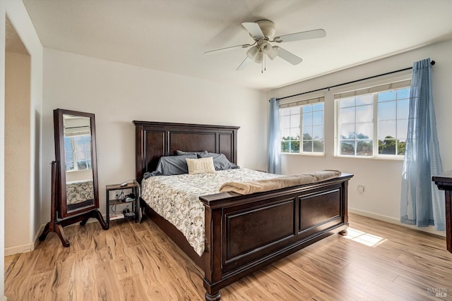 236 Cogburn Way, Vacaville, CA 95687 - bedroom with light wood-type flooring, baseboards, and a ceiling fan