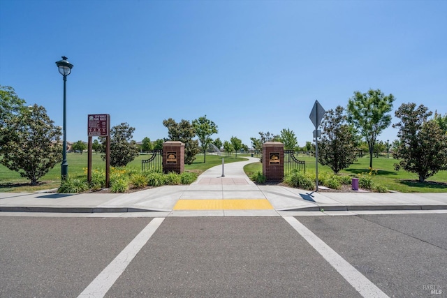 236 Cogburn Way, Vacaville, CA 95687 - view of road with sidewalks, traffic signs, and street lighting