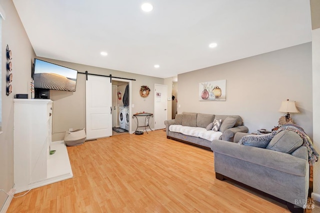 1405 Montana Pl, Rohnert Park, CA 94928 - living room featuring washer and clothes dryer, a barn door, light wood-type flooring, and recessed lighting