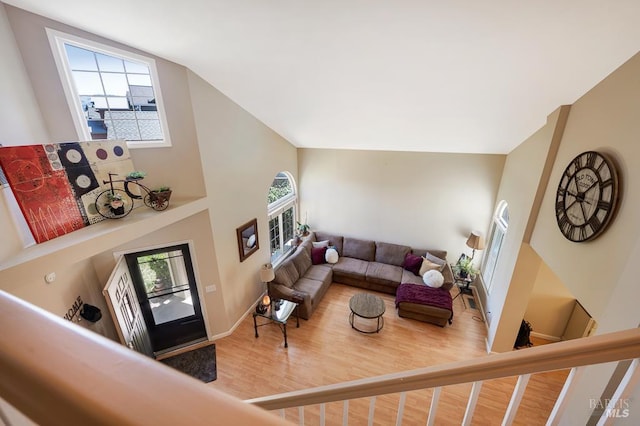 1405 Montana Pl, Rohnert Park, CA 94928 - living room featuring plenty of natural light, wood finished floors, high vaulted ceiling, and baseboards