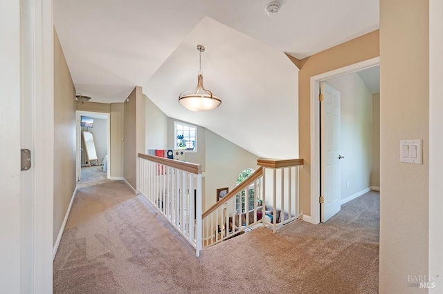 1405 Montana Pl, Rohnert Park, CA 94928 - hallway featuring an upstairs landing, carpet, vaulted ceiling, and baseboards