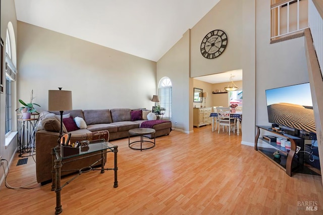 1405 Montana Pl, Rohnert Park, CA 94928 - living area with high vaulted ceiling, light wood-style floors, and baseboards