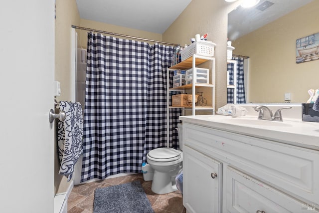 50 S A St, Santa Rosa, CA 95401 - bathroom featuring vanity, toilet, stone finish floors, and a shower with shower curtain