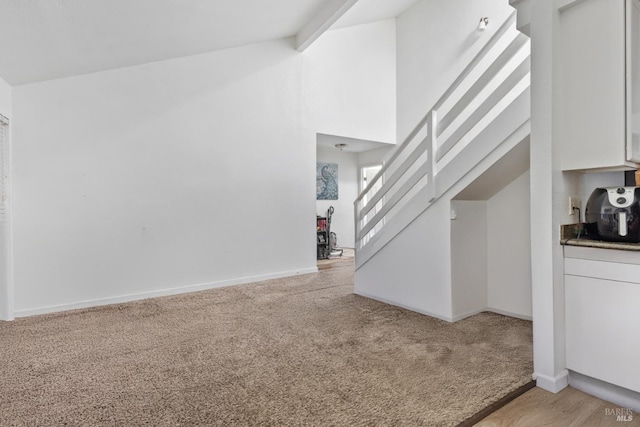 50 S A St, Santa Rosa, CA 95401 - stairway with carpet, vaulted ceiling, and baseboards