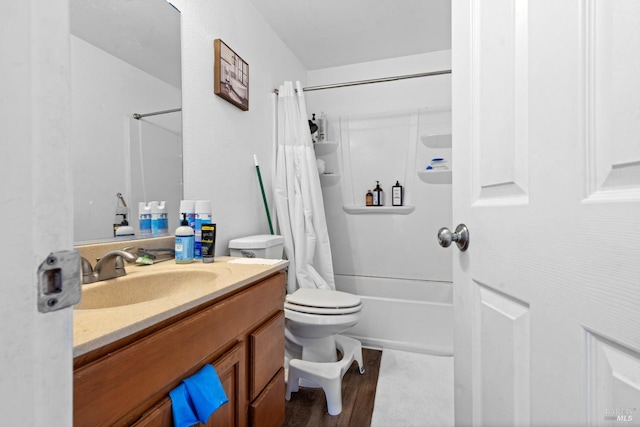 50 S A St, Santa Rosa, CA 95401 - full bathroom featuring vanity, shower / bath combo with shower curtain, toilet, and wood finished floors