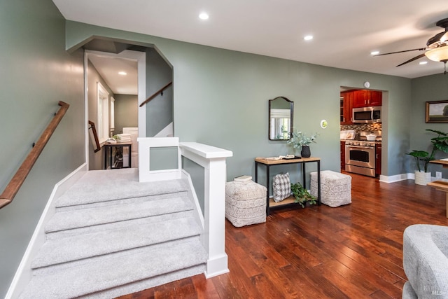 225 Berna Ave, Napa, CA 94559 - stairs featuring a ceiling fan, wood finished floors, recessed lighting, arched walkways, and baseboards