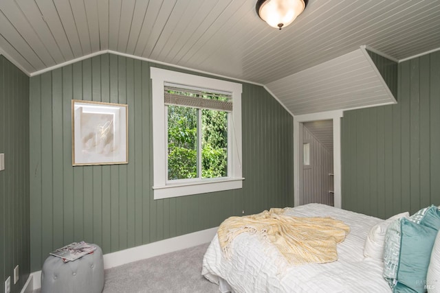225 Berna Ave, Napa, CA 94559 - bedroom featuring vaulted ceiling, carpet flooring, wooden walls, and baseboards