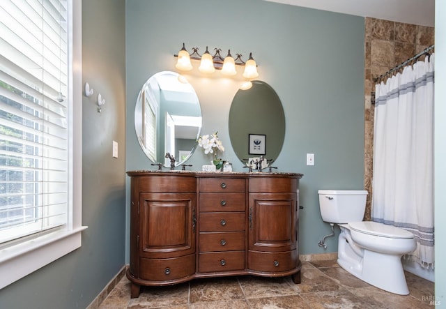 225 Berna Ave, Napa, CA 94559 - bathroom with baseboards, double vanity, toilet, and a shower with curtain