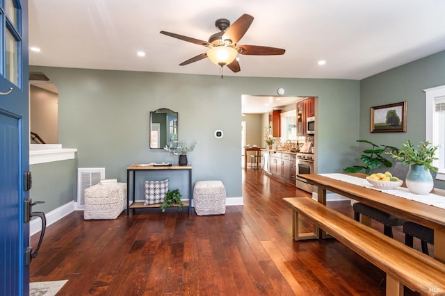 225 Berna Ave, Napa, CA 94559 - dining area with a ceiling fan, arched walkways, dark wood-style floors, baseboards, and recessed lighting