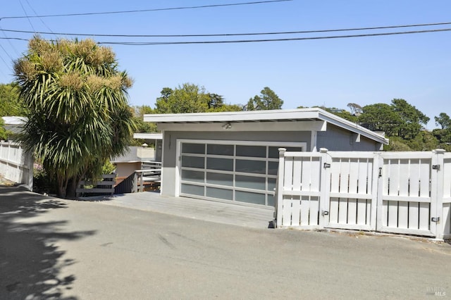 1131 W California Ave, Mill Valley, CA 94941 - detached garage featuring a gate