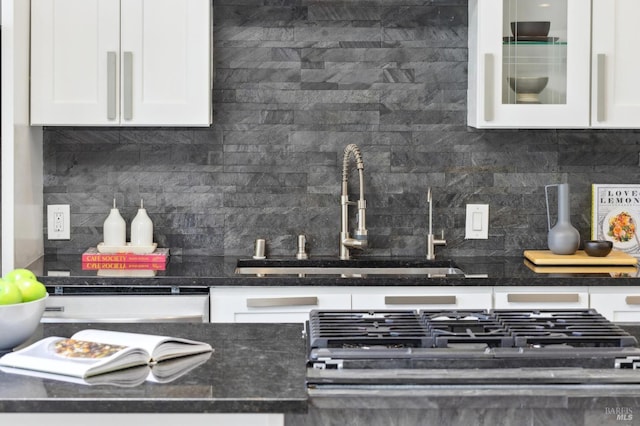 1131 W California Ave, Mill Valley, CA 94941 - kitchen featuring a sink, decorative backsplash, white cabinets, and glass insert cabinets