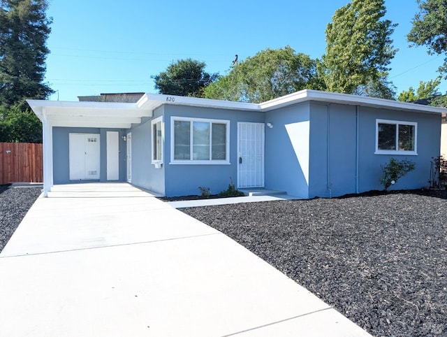 820 Fulton Ave, Vallejo, CA 94591 - single story home with driveway, an attached carport, stucco siding, and board and batten siding