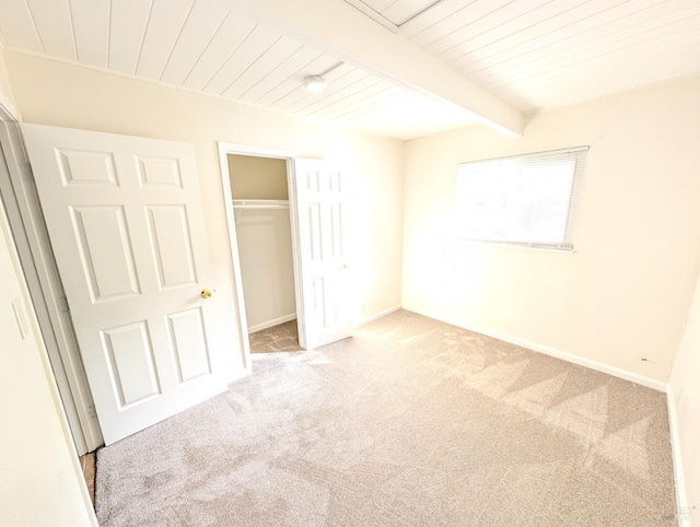 820 Fulton Ave, Vallejo, CA 94591 - unfurnished bedroom with carpet floors, wood ceiling with exposed beams, a closet, and baseboards