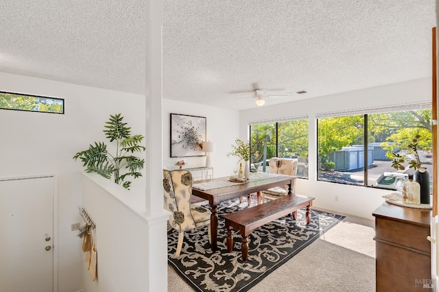 2000 Clearview Cir, Benicia, CA 94510 - carpeted dining room featuring a textured ceiling and ceiling fan