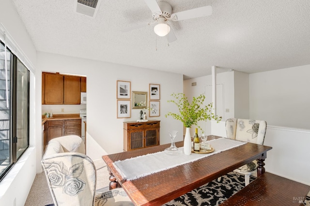 2000 Clearview Cir, Benicia, CA 94510 - dining room with a textured ceiling and ceiling fan