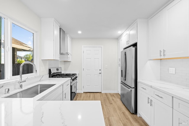 2410 Pinercrest Dr, Santa Rosa, CA 95403 - kitchen with stainless steel appliances, a sink, light wood-style flooring, recessed lighting, and white cabinets