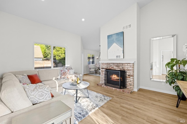 2410 Pinercrest Dr, Santa Rosa, CA 95403 - living room featuring high vaulted ceiling, wood finished floors, a fireplace, baseboards, and recessed lighting