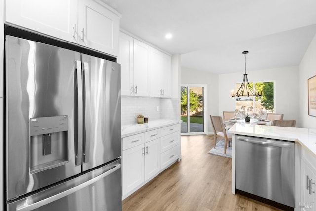 2410 Pinercrest Dr, Santa Rosa, CA 95403 - kitchen featuring appliances with stainless steel finishes, decorative backsplash, white cabinetry, light wood finished floors, and recessed lighting