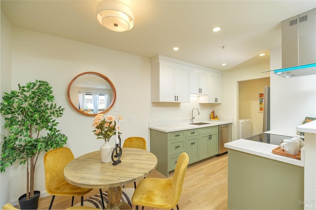 8201 Camino Colegio Unit 17, Rohnert Park, CA 94928 - kitchen featuring extractor fan, cooktop, light wood-style floors, light countertops, and dishwasher