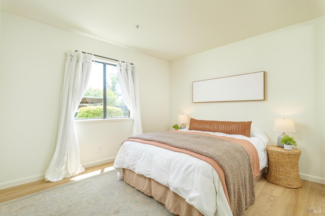 8201 Camino Colegio Unit 17, Rohnert Park, CA 94928 - bedroom with wood finished floors and baseboards