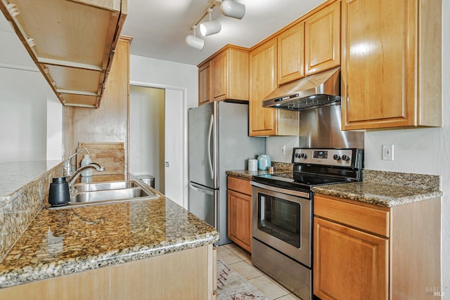 111 Cheda Ln, Novato, CA 94947 - kitchen with under cabinet range hood, appliances with stainless steel finishes, a sink, light tile patterned floors, and rail lighting