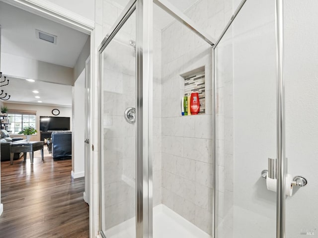 1233 Lincoln St, Fairfield, CA 94533 - bathroom featuring a shower stall and wood finished floors