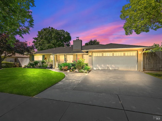 1233 Lincoln St, Fairfield, CA 94533 - single story home with concrete driveway, a garage, a chimney, and stucco siding