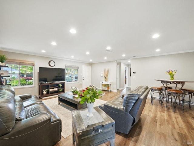 1233 Lincoln St, Fairfield, CA 94533 - living area featuring ornamental molding, recessed lighting, healthy amount of natural light, and light wood-type flooring