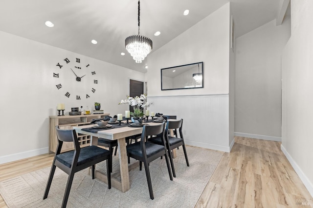9508 Jessica Dr, Windsor, CA 95492 - dining area featuring light wood-type flooring, a chandelier, recessed lighting, wainscoting, and lofted ceiling