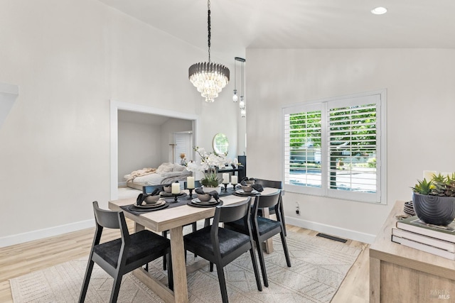 9508 Jessica Dr, Windsor, CA 95492 - dining space with light wood finished floors, a chandelier, and baseboards