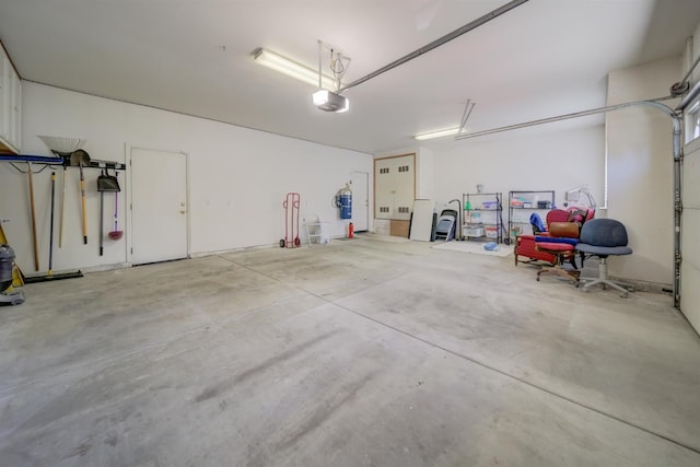 3543 Oak Shores Dr, Stockton, CA 95209 - garage featuring a central vacuum unit and a garage door opener