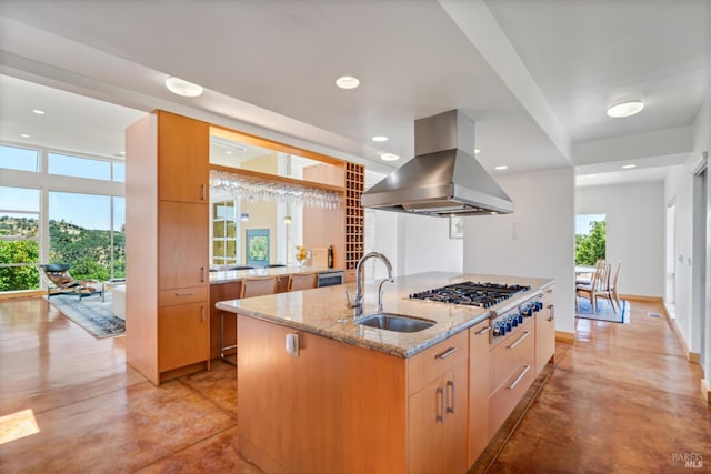 48 Longhorn Ridge Rd, Napa, CA 94558 - kitchen featuring island exhaust hood, a sink, finished concrete floors, stainless steel gas stovetop, and an island with sink