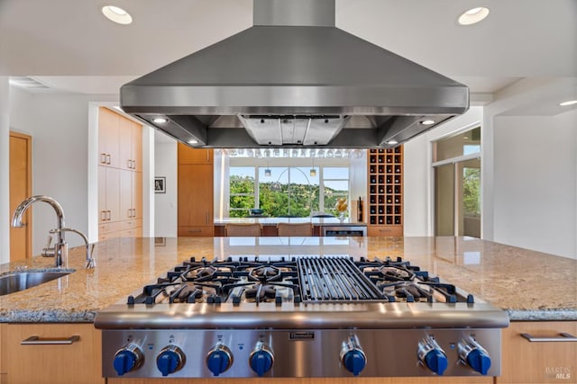 48 Longhorn Ridge Rd, Napa, CA 94558 - kitchen featuring island range hood, stainless steel gas cooktop, a sink, recessed lighting, and light stone counters
