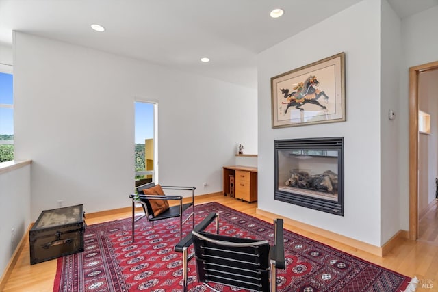 48 Longhorn Ridge Rd, Napa, CA 94558 - living room with a glass covered fireplace, wood finished floors, recessed lighting, and baseboards