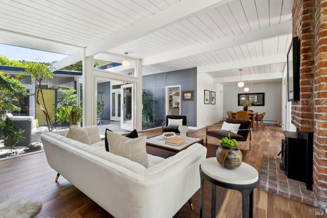 100 De La Guerra Rd, San Rafael, CA 94903 - living room with wood finished floors, baseboards, a baseboard heating unit, and a wood stove