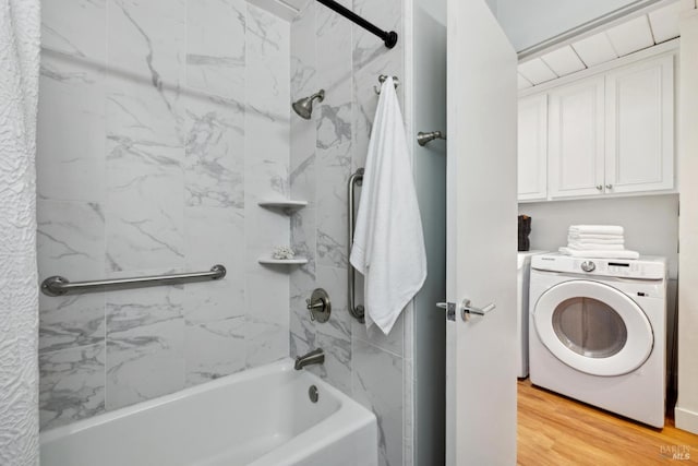 100 De La Guerra Rd, San Rafael, CA 94903 - bathroom with washer / dryer, shower / tub combination, and wood finished floors