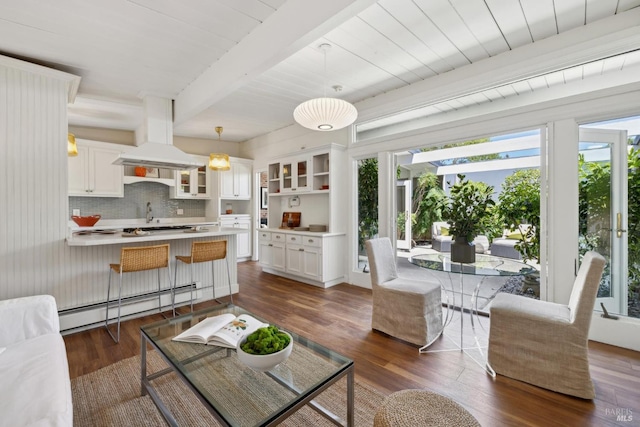 100 De La Guerra Rd, San Rafael, CA 94903 - living room featuring a baseboard heating unit, dark wood-style floors, and beam ceiling