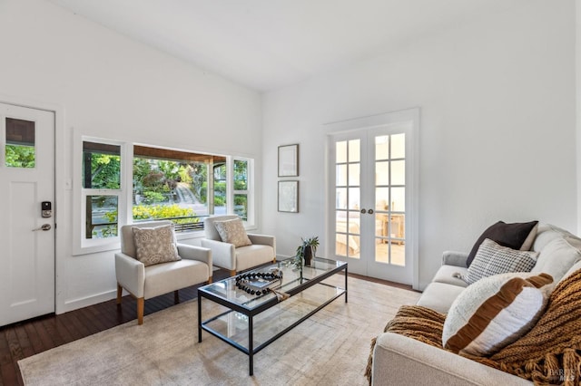 516 Howard St, Petaluma, CA 94952 - living room with french doors, light wood-style floors, and baseboards
