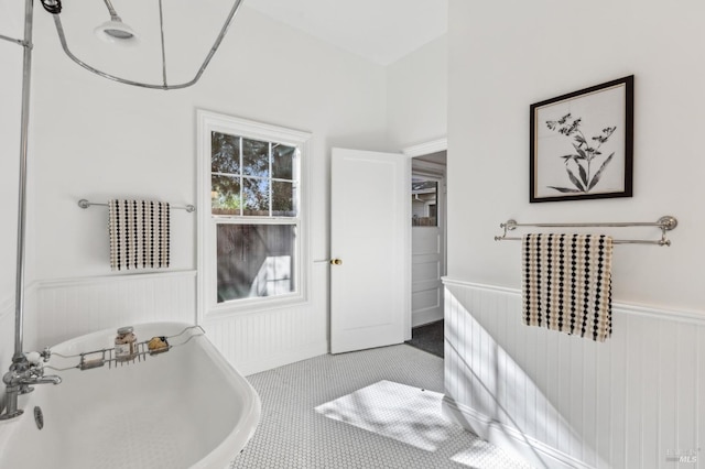 516 Howard St, Petaluma, CA 94952 - bathroom featuring wainscoting and a freestanding bath