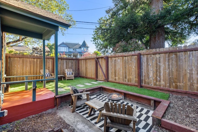 516 Howard St, Petaluma, CA 94952 - fenced backyard featuring an outdoor fire pit