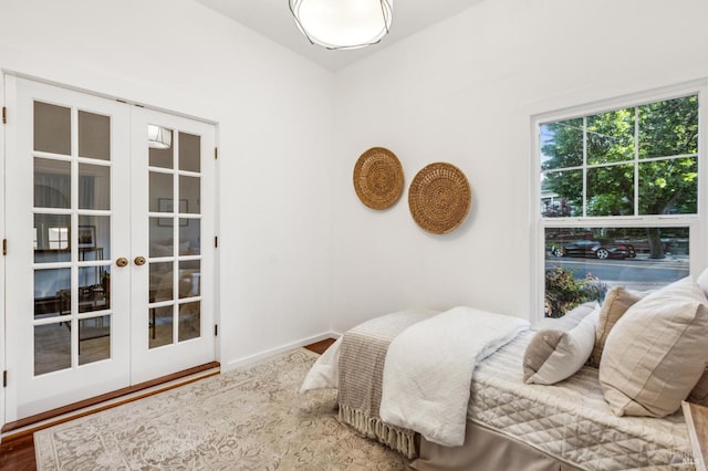 516 Howard St, Petaluma, CA 94952 - bedroom with french doors, baseboards, and wood finished floors