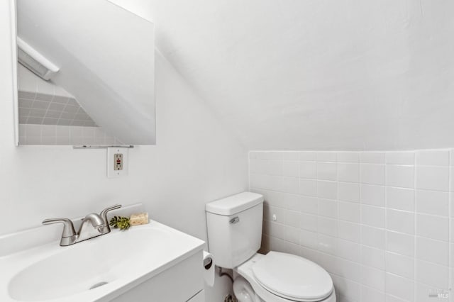 516 Howard St, Petaluma, CA 94952 - half bathroom with toilet, vanity, and vaulted ceiling