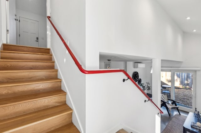 516 Howard St, Petaluma, CA 94952 - stairs featuring a high ceiling, a wall mounted AC, and recessed lighting