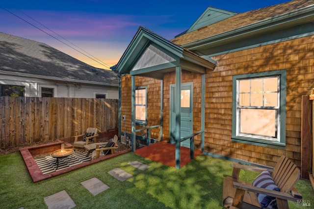 516 Howard St, Petaluma, CA 94952 - back of house at dusk featuring a fire pit