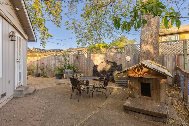 1133 Cielo Cir, Rohnert Park, CA 94928 - fenced backyard featuring a patio area, outdoor dining area, and entry steps