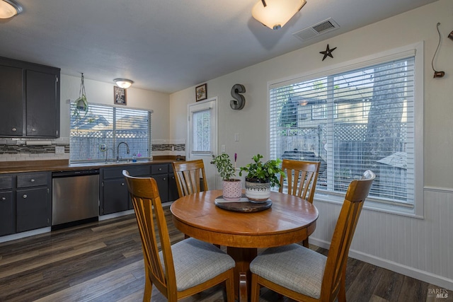 1133 Cielo Cir, Rohnert Park, CA 94928 - dining room with dark wood-style floors and wainscoting