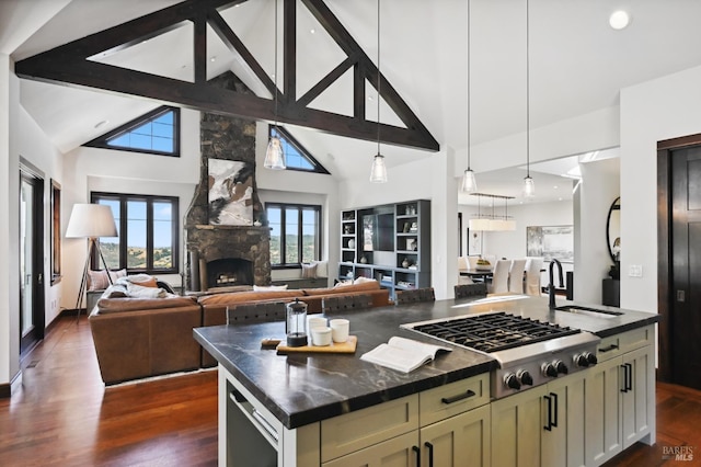 541 Oak Ave, San Anselmo, CA 94960 - kitchen with stainless steel gas stovetop, a sink, dark countertops, high vaulted ceiling, and open floor plan