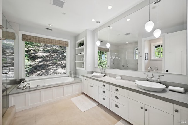 541 Oak Ave, San Anselmo, CA 94960 - bathroom featuring plenty of natural light, a stall shower, double vanity, a garden tub, and recessed lighting