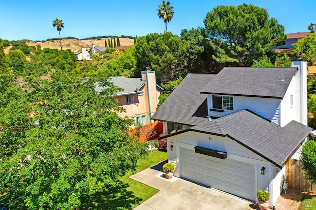 138 Nicole Way, Vallejo, CA 94589 - view of front of house featuring a shingled roof, an attached garage, and concrete driveway